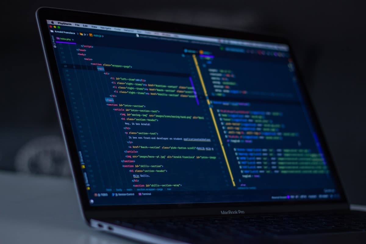 A laptop showing source code — the foundation of an LLM Wiki
